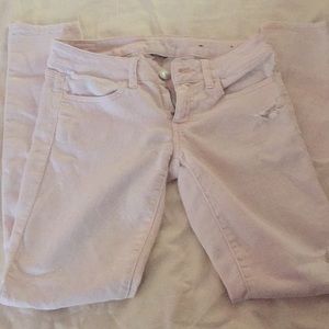 American eagle jeans in light pink wash.